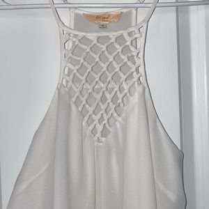 Last April Naked Zebra white tank top size s